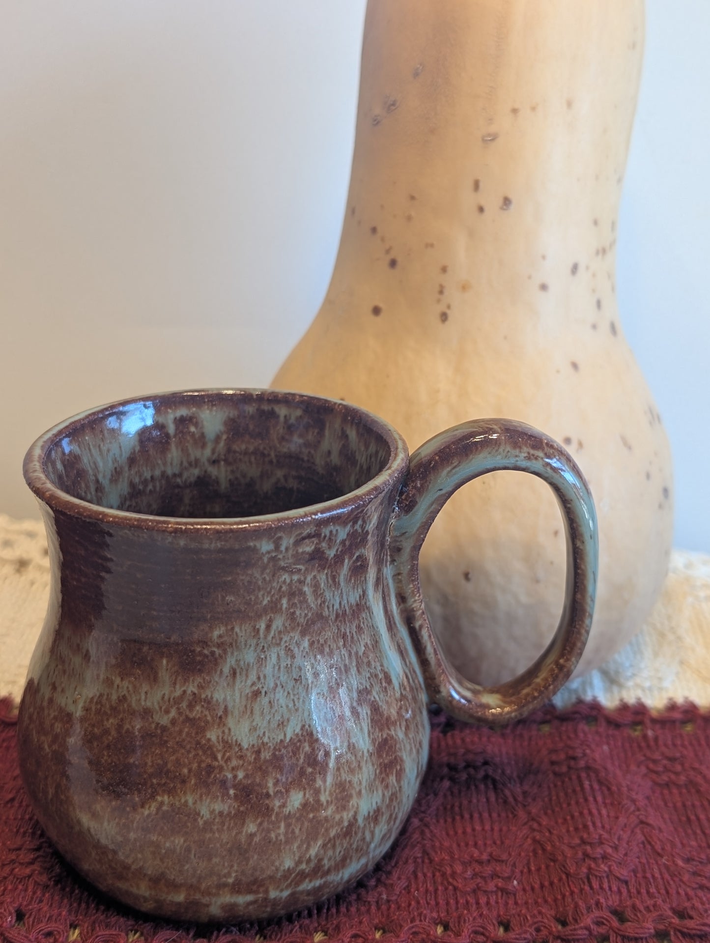 Green and brown mug